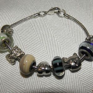 SNAKE BRACELET WITH NINE(9) CHARMS~TEDDY BEAR, CAT